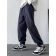 Men's Casual Loose Fit Drawstring Sweatpants For Casual Daily Wear Men's Casual Loose Fit Drawstring Sweatpants For Casual Daily Wear